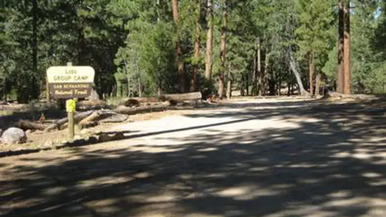 Shade and the Lobo Group Campground Sign