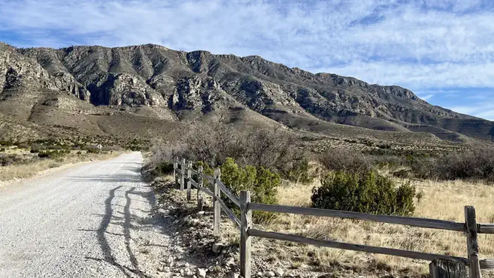 Gravel road leading into the Frijole Ranch area.  Views of the Guadalupe Mountains in the background.