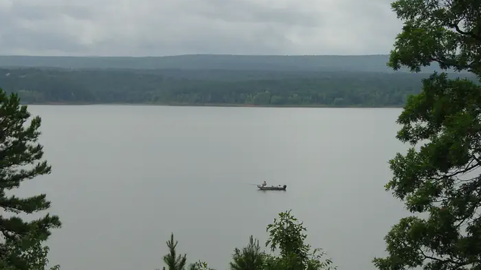 lone boat on a large lake