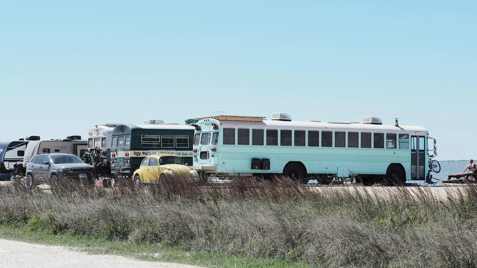 Converted Schoolies parked at BIB CG