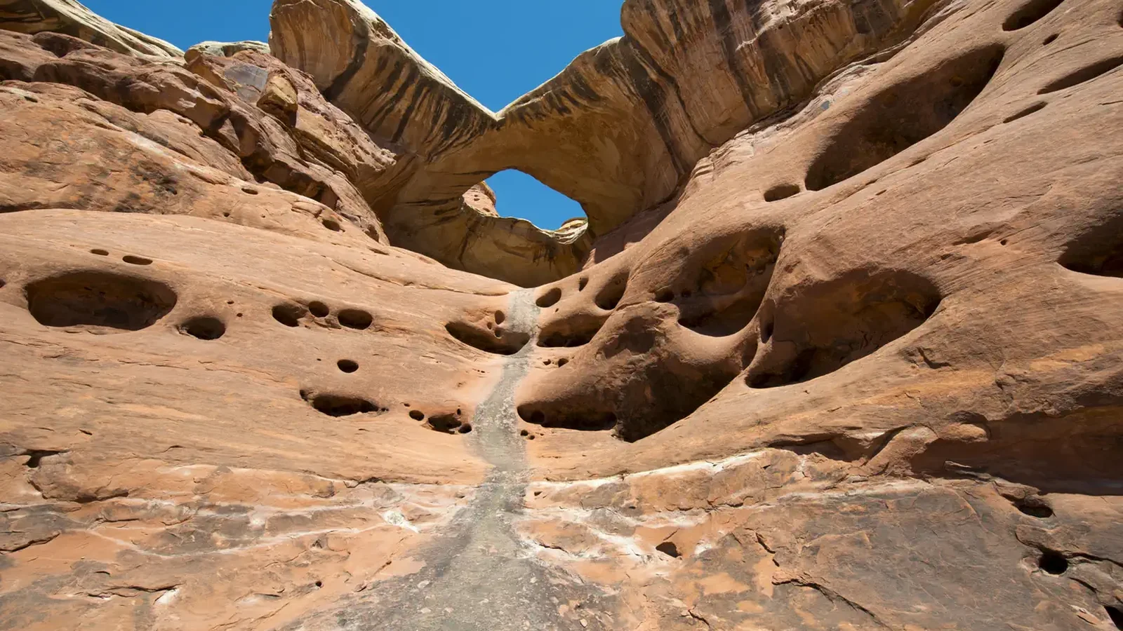 Paul Bunyans Potty is a large pothole arch in The Needles district