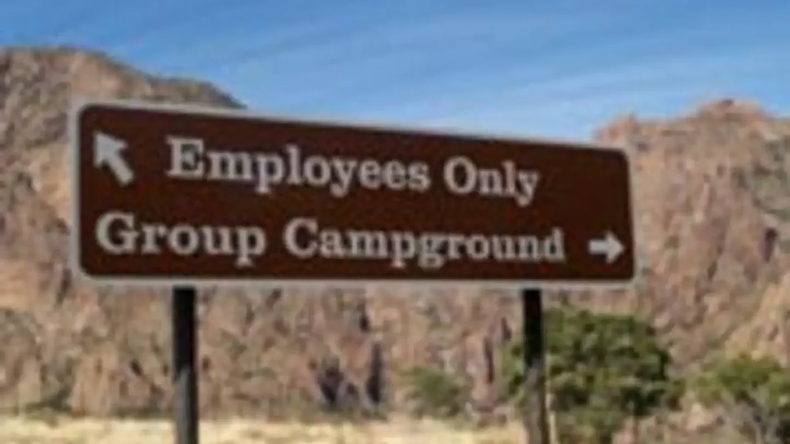 Sign on roadway leading to the Group Campground