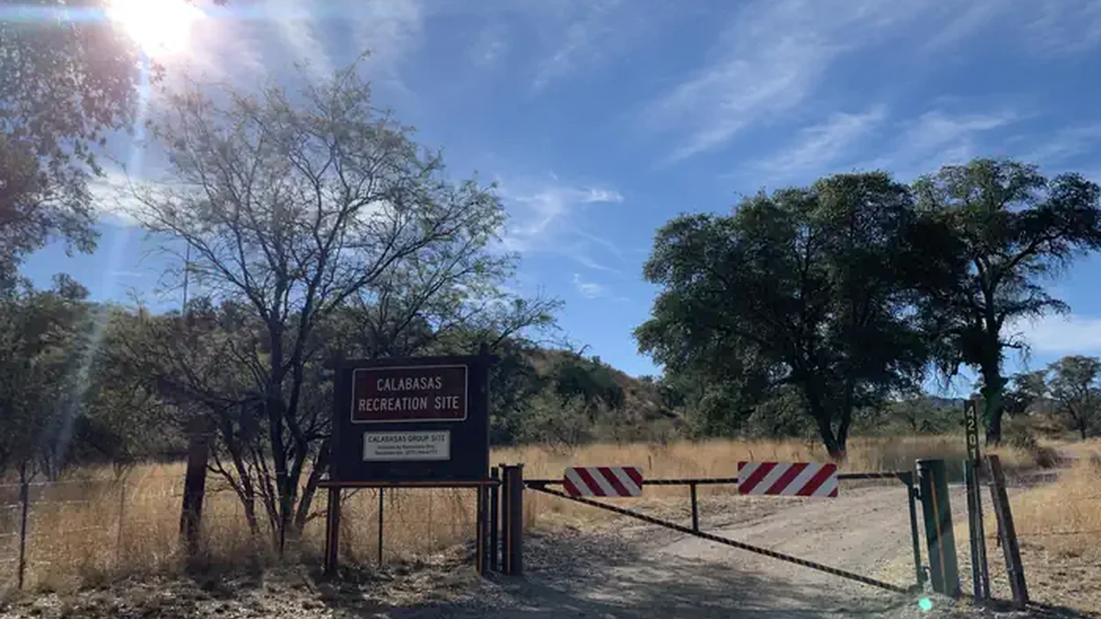 A locked entry gate to the campground with a sign that says "Calabasas Recreation Site"ite