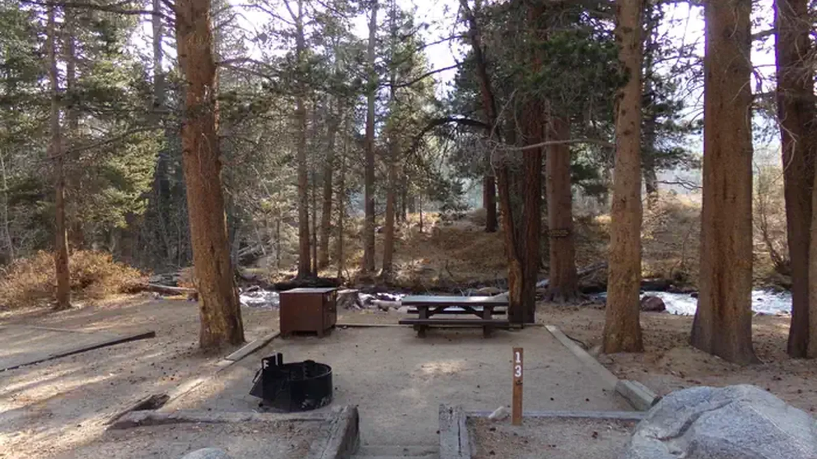Campsite by the creek at Bishop Park