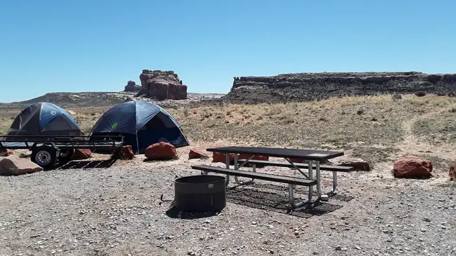 Courthouse Rock Campground campsites with rock formation in the background