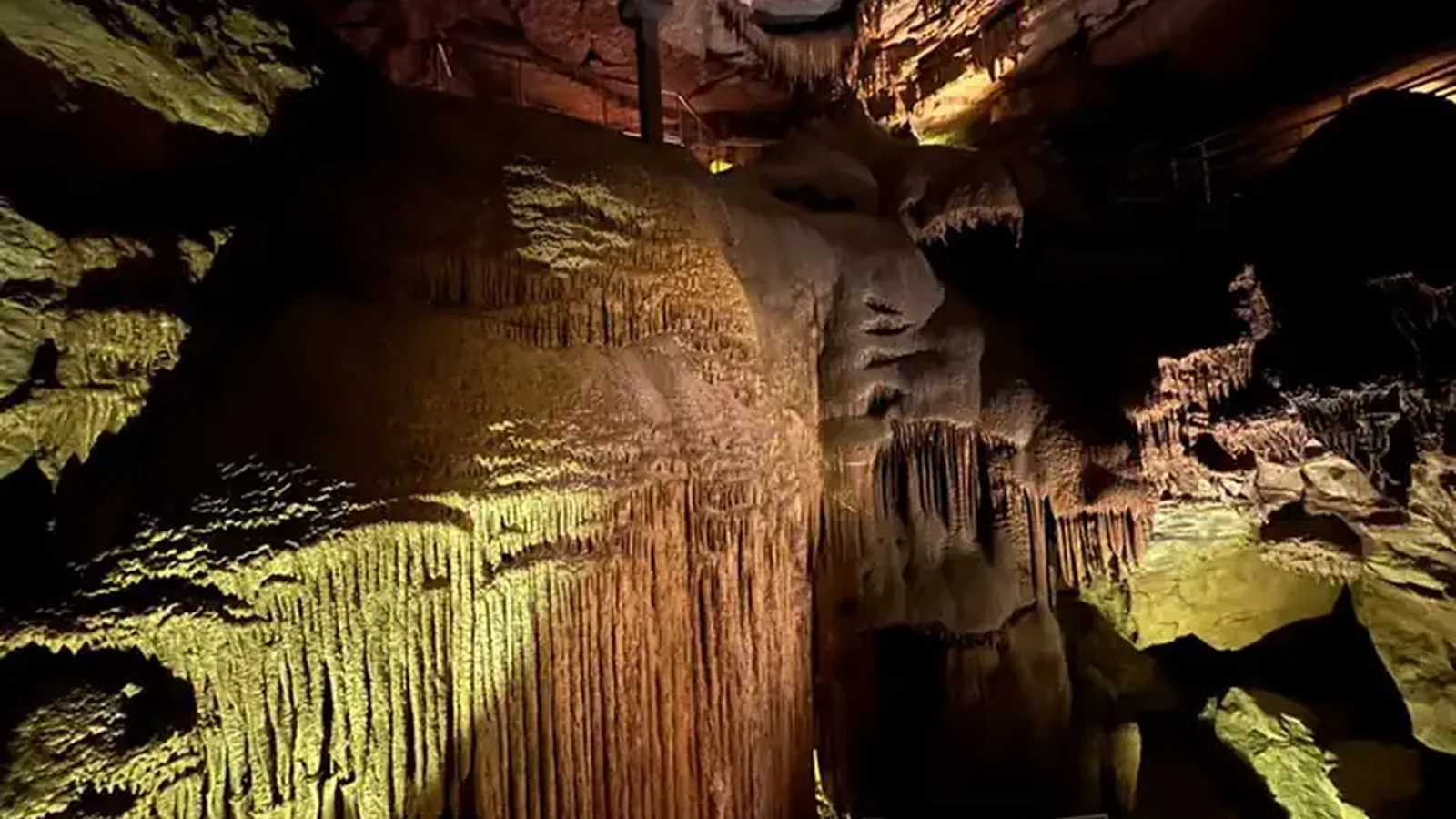 Large flowstone formation that is like a waterfall frozen in time